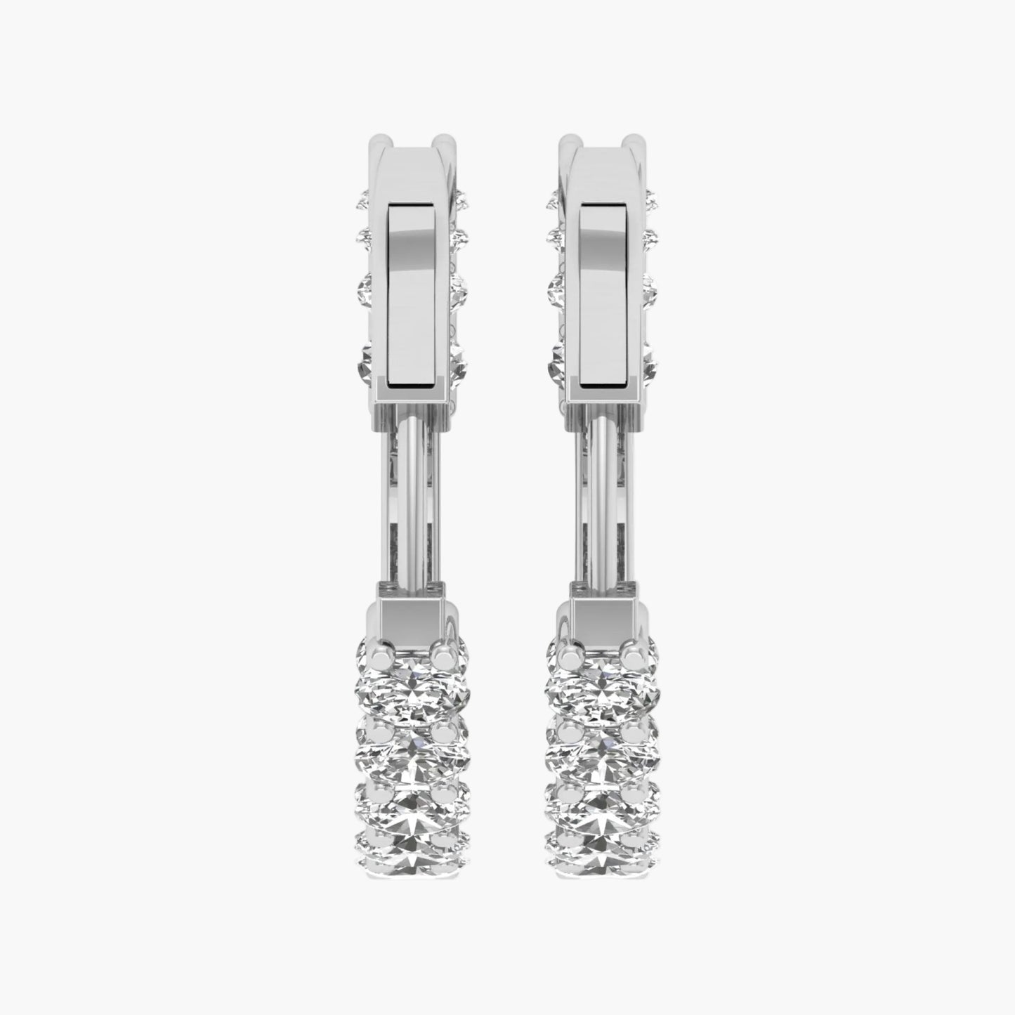 Pair of diamond earrings on a white background