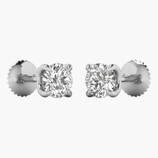Pair of diamond stud earrings on a white background