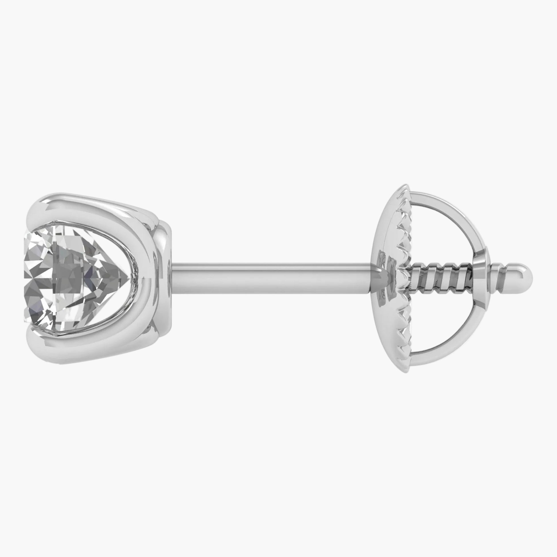 Silver earring with a clear gemstone on a white background