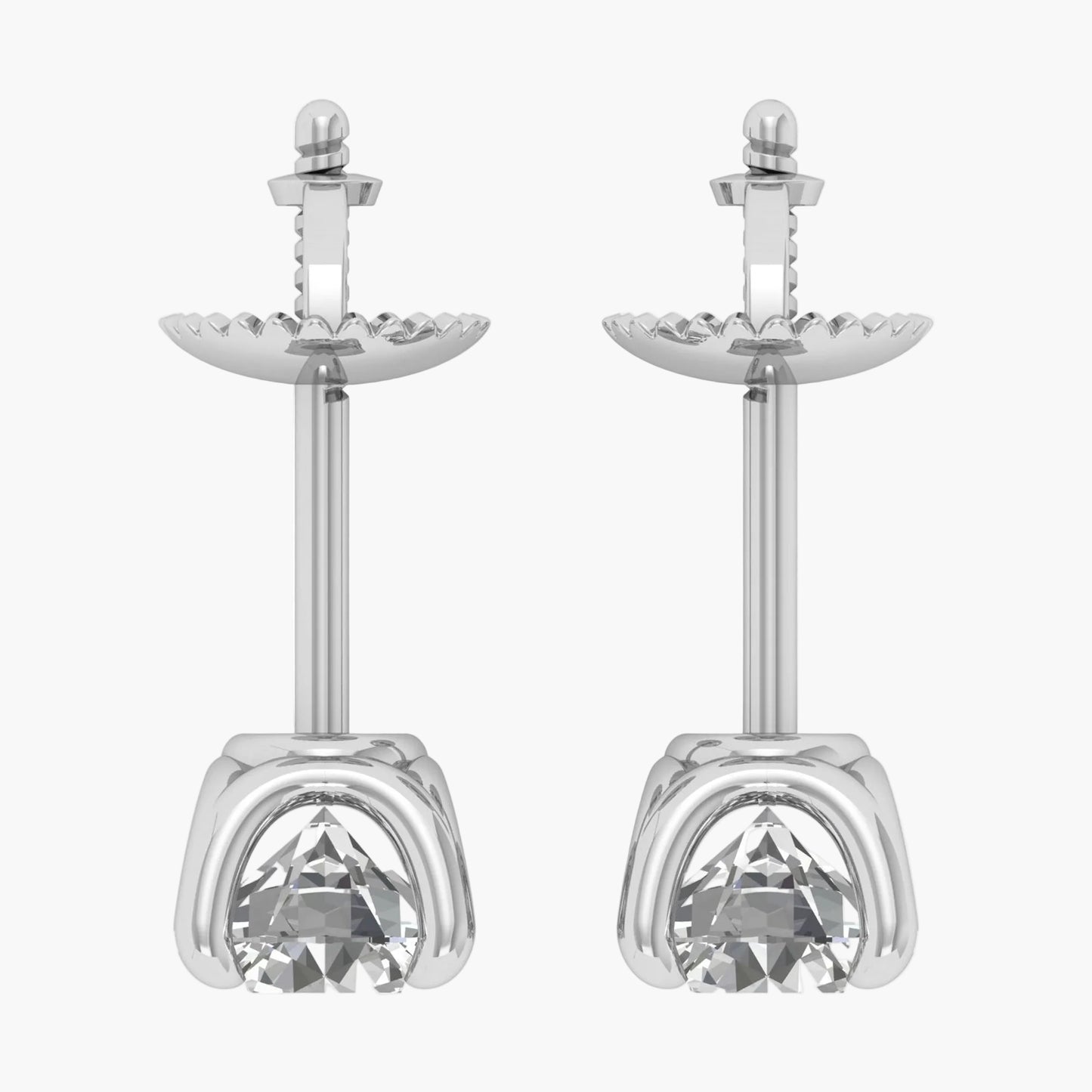 Pair of silver earrings with clear gemstones on a white background