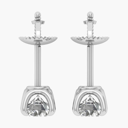 Pair of silver earrings with clear gemstones on a white background