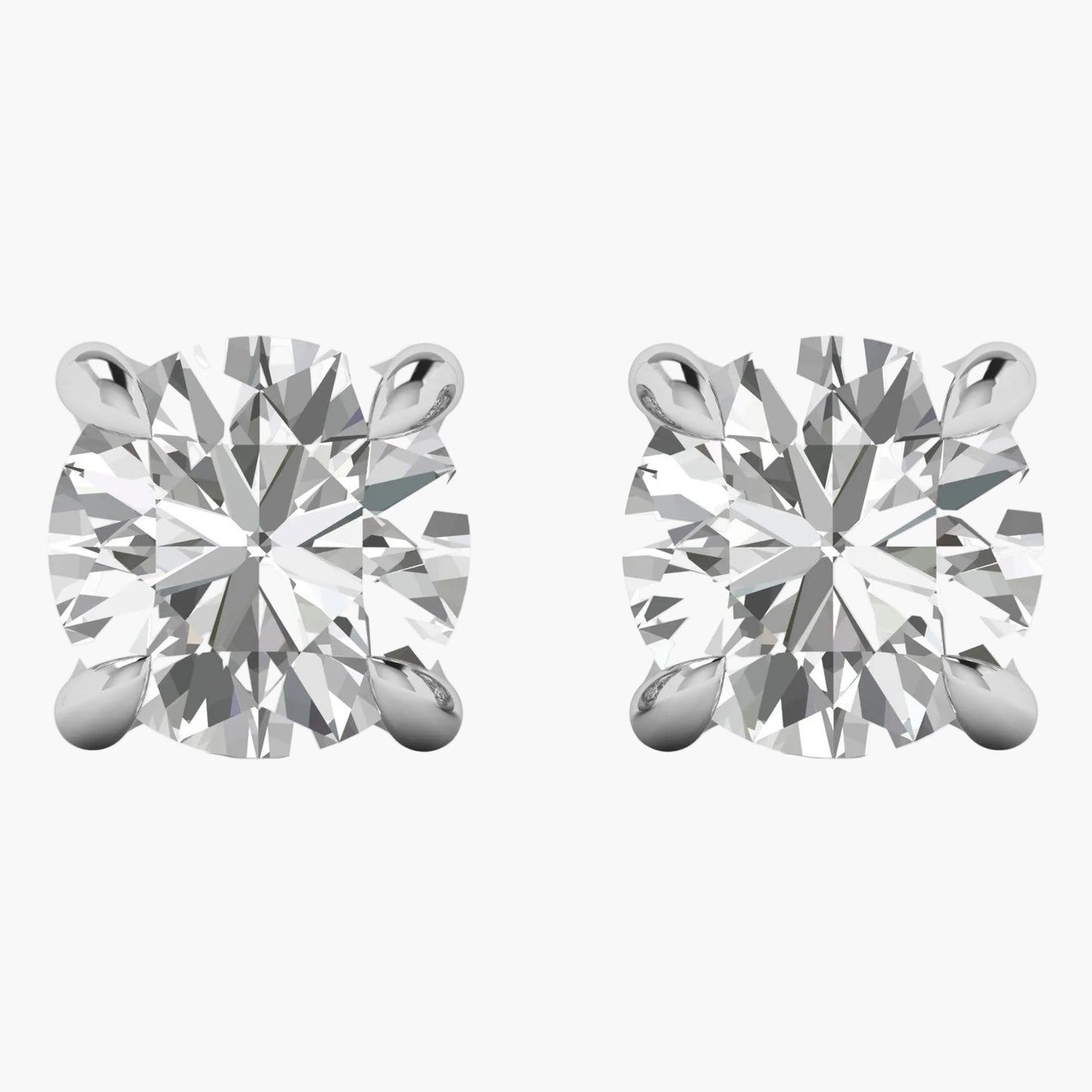 Pair of diamond stud earrings on a white background