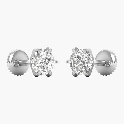 Pair of diamond stud earrings on a white background