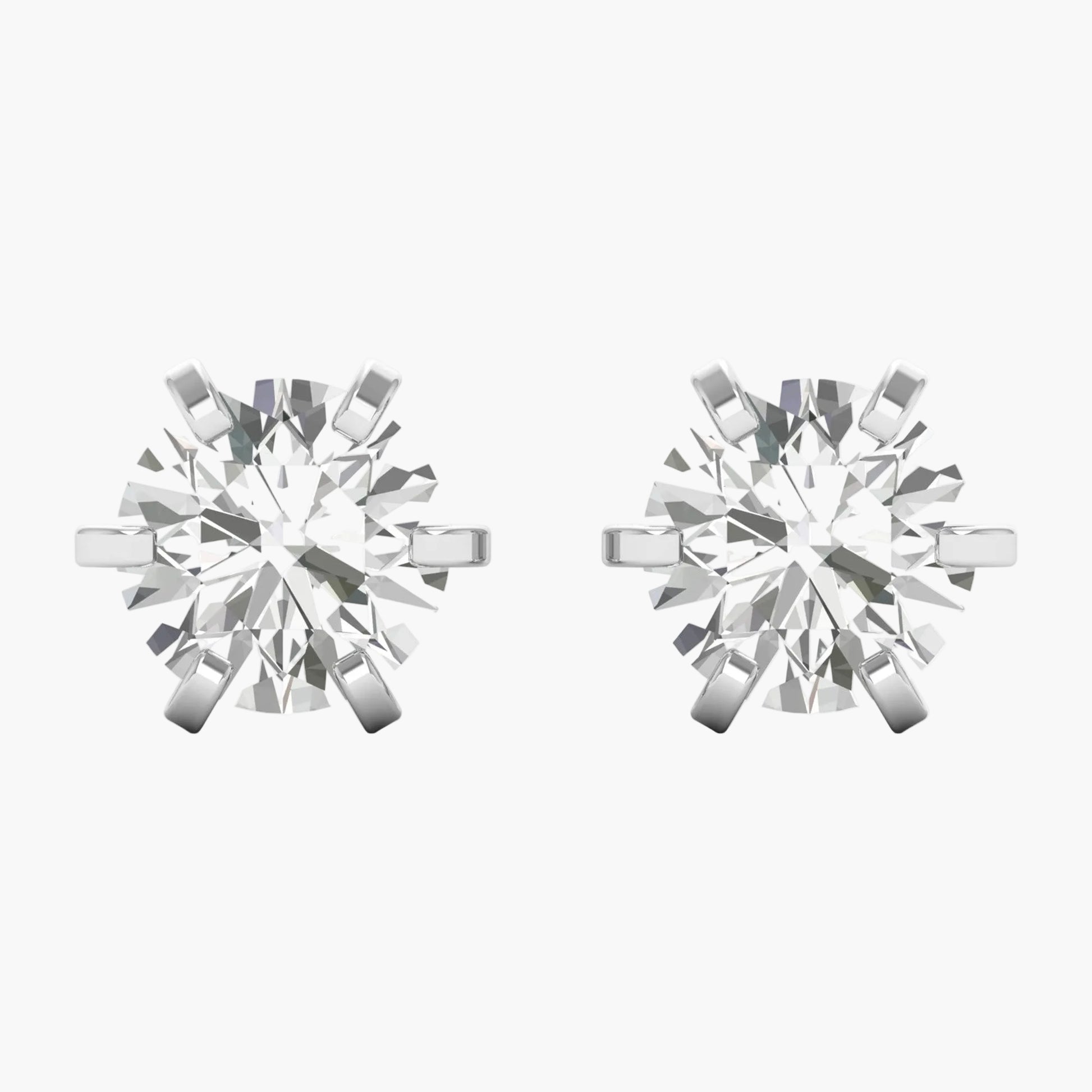 Pair of silver snowflake-shaped earrings on a white background
