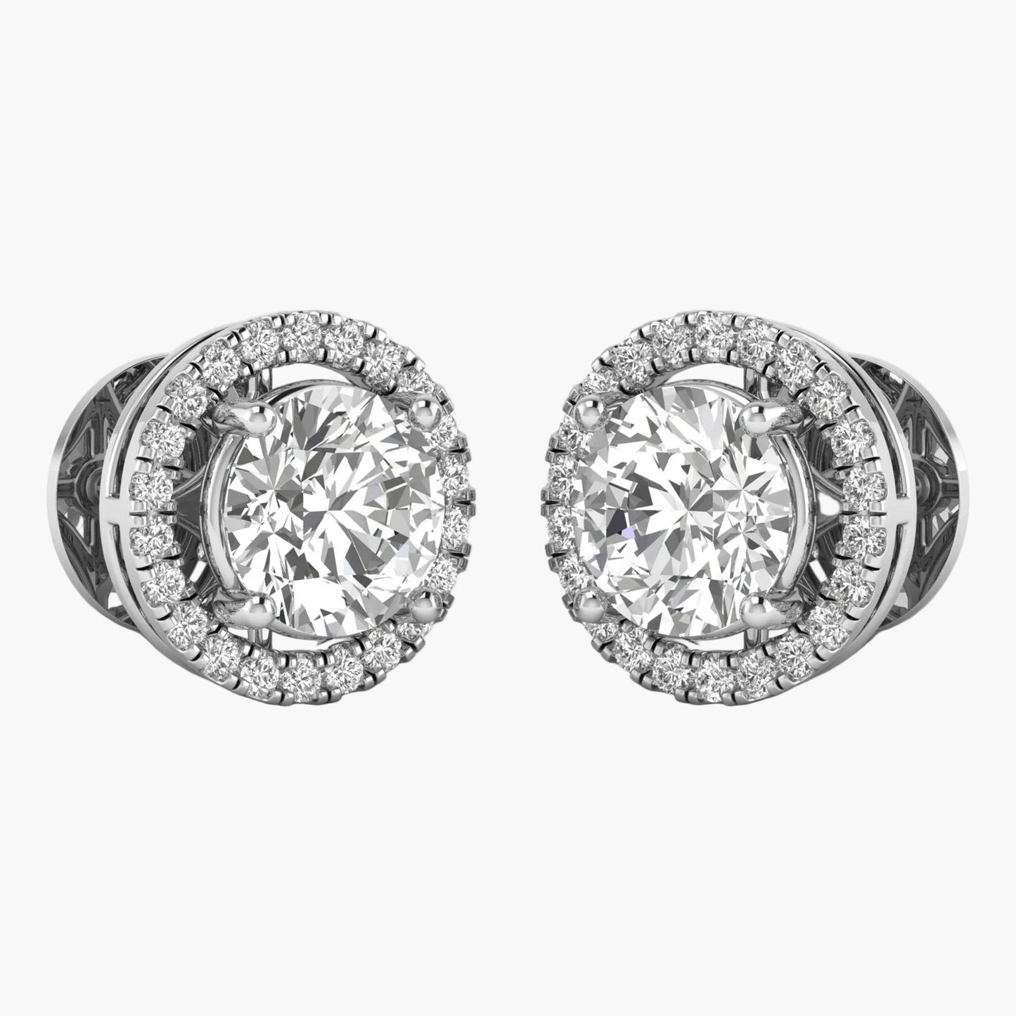 Pair of diamond stud earrings on a white background