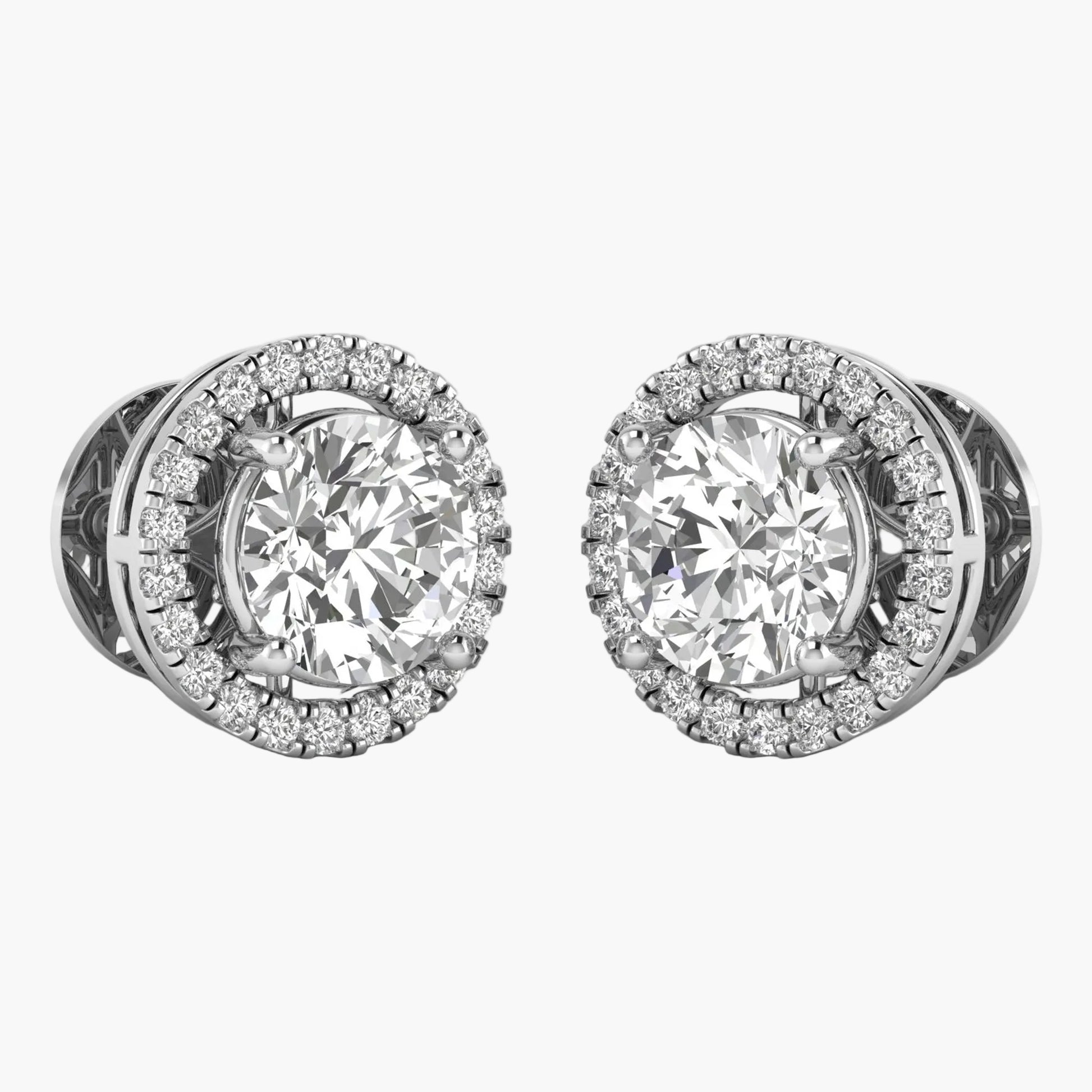 Pair of diamond stud earrings on a white background