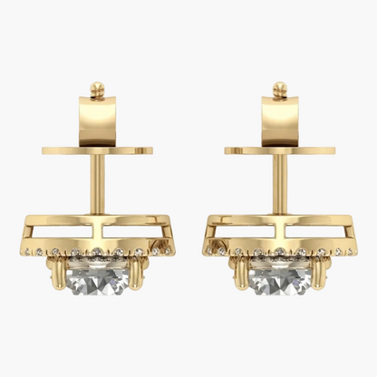 A pair of gold geometric stud earrings with a large clear marquise-cut center stone and small clear accent stones, shown on a plain white background.