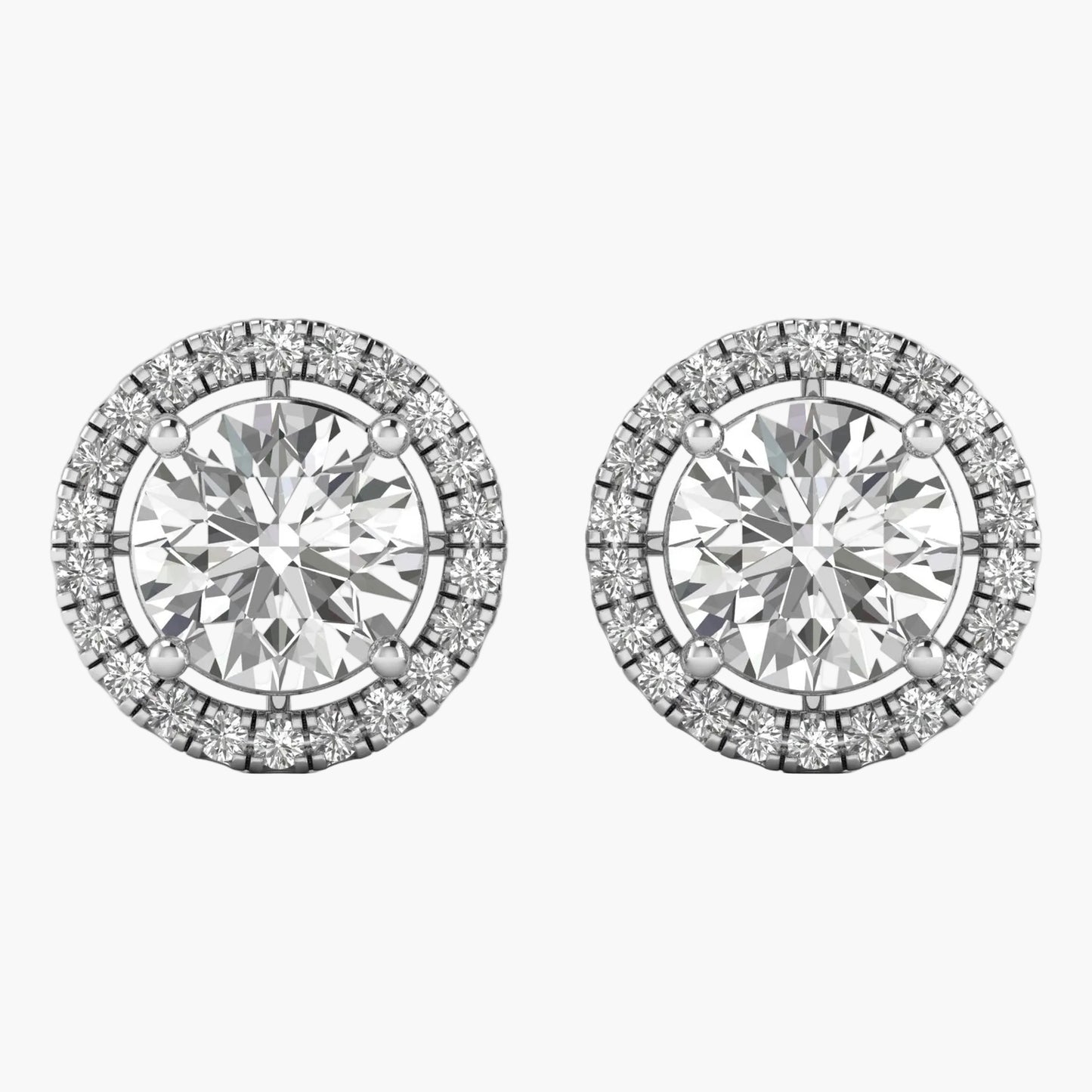 Pair of round diamond stud earrings on a white background