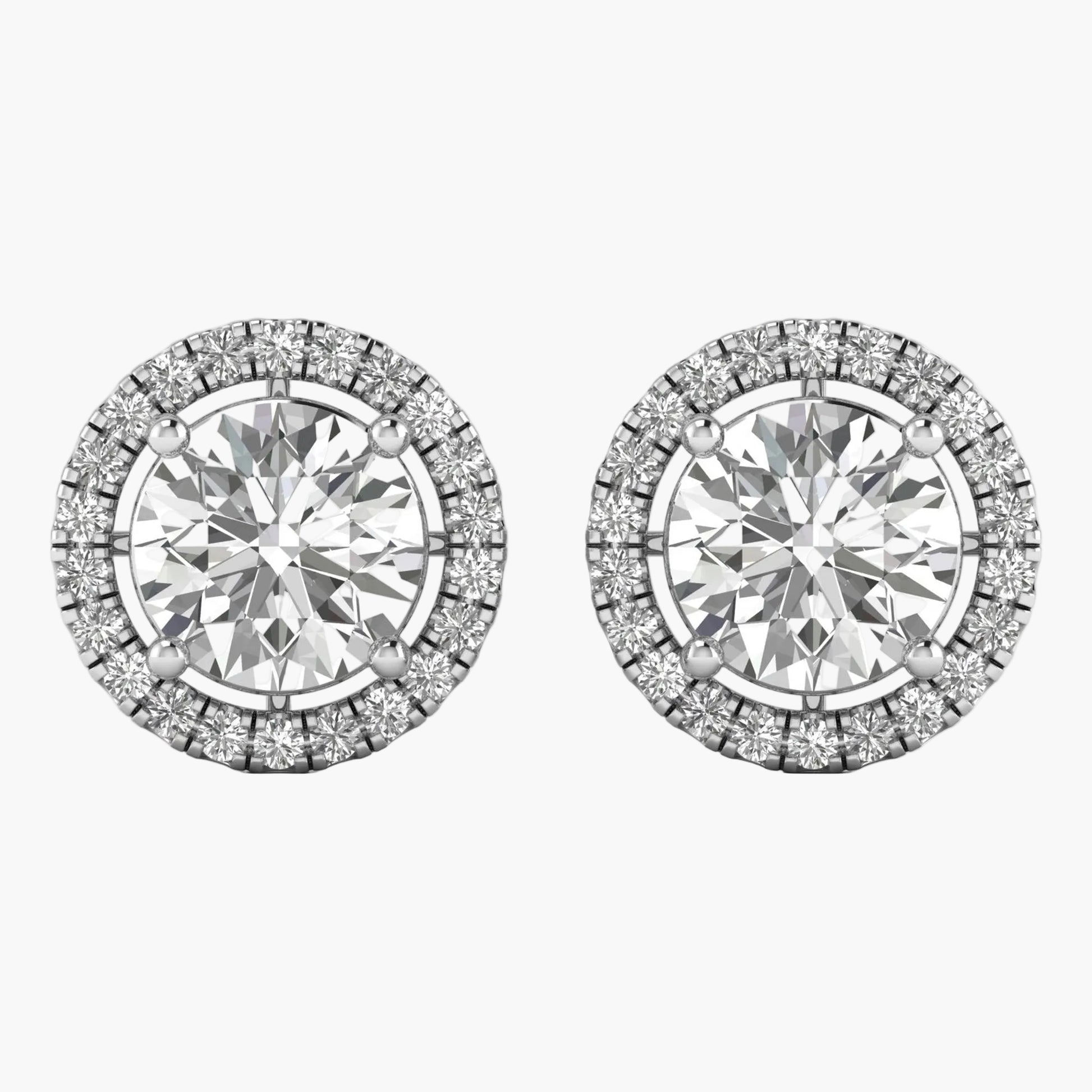 Pair of round diamond stud earrings on a white background