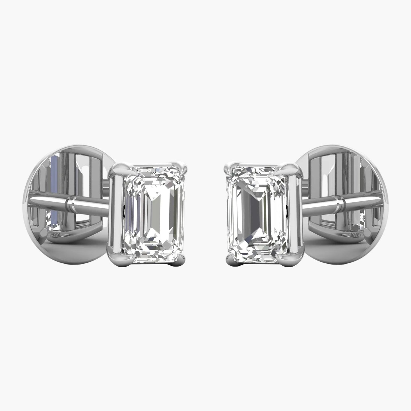 Pair of diamond stud earrings on a white background