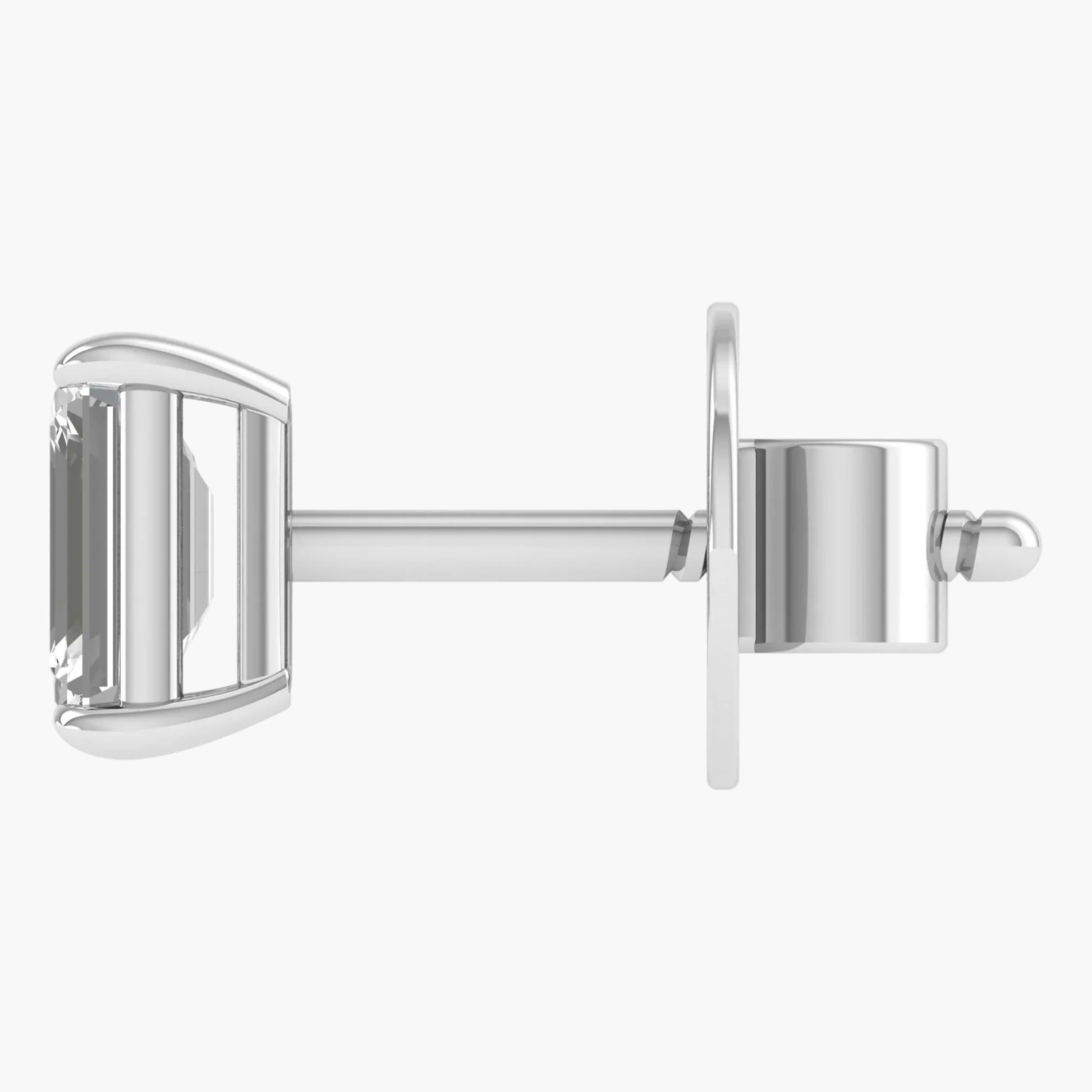 Silver earring with a clear gemstone on a white background