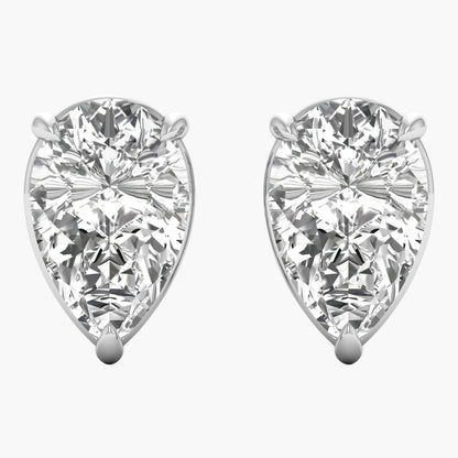 Pair of pear-shaped diamond earrings on a white background