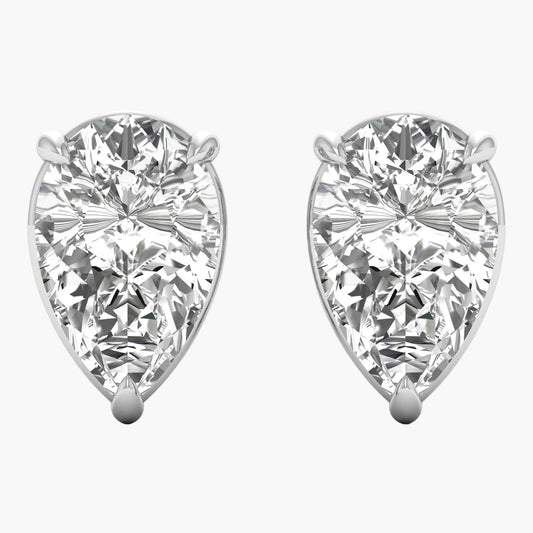 Pair of pear-shaped diamond earrings on a white background