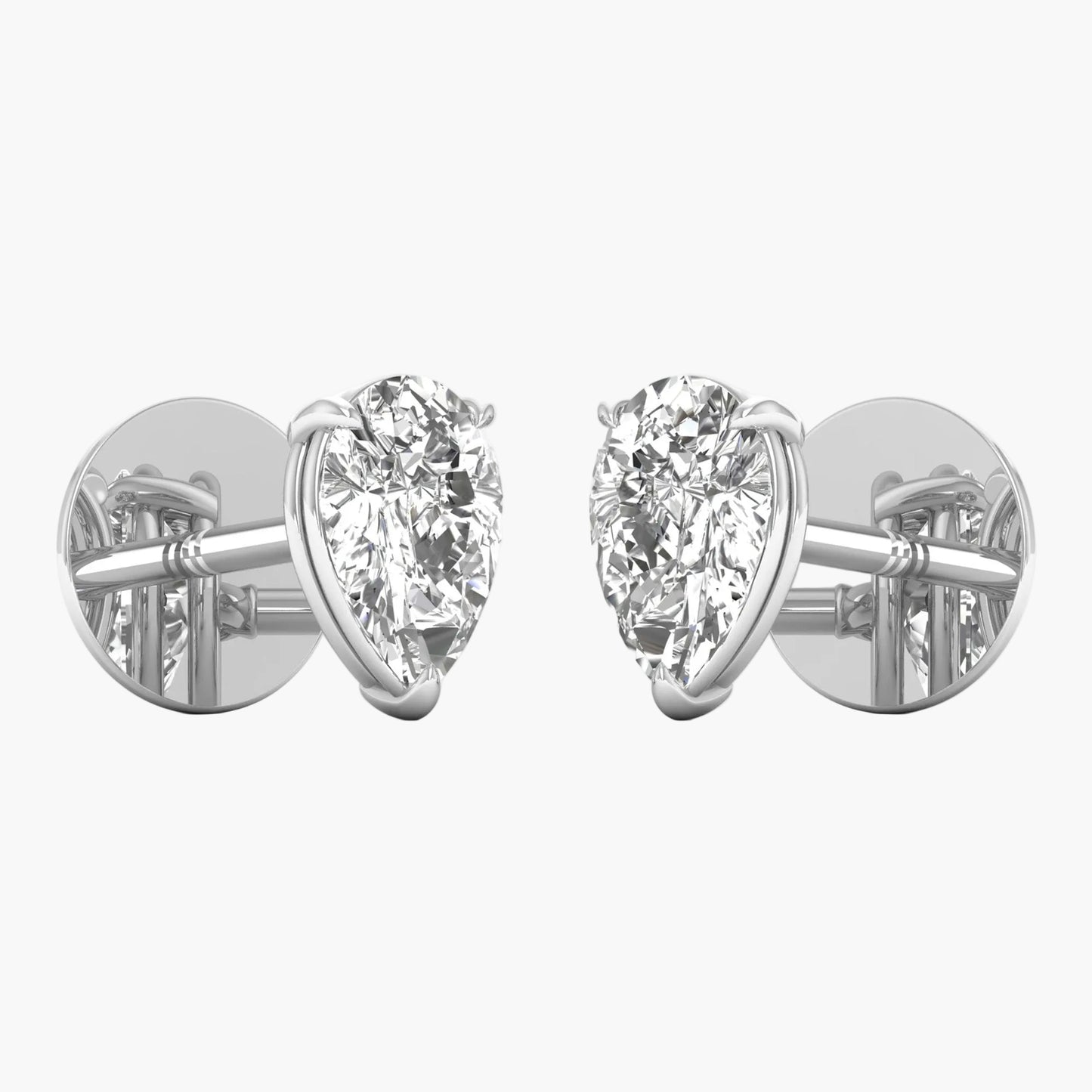 Pair of diamond stud earrings on a white background