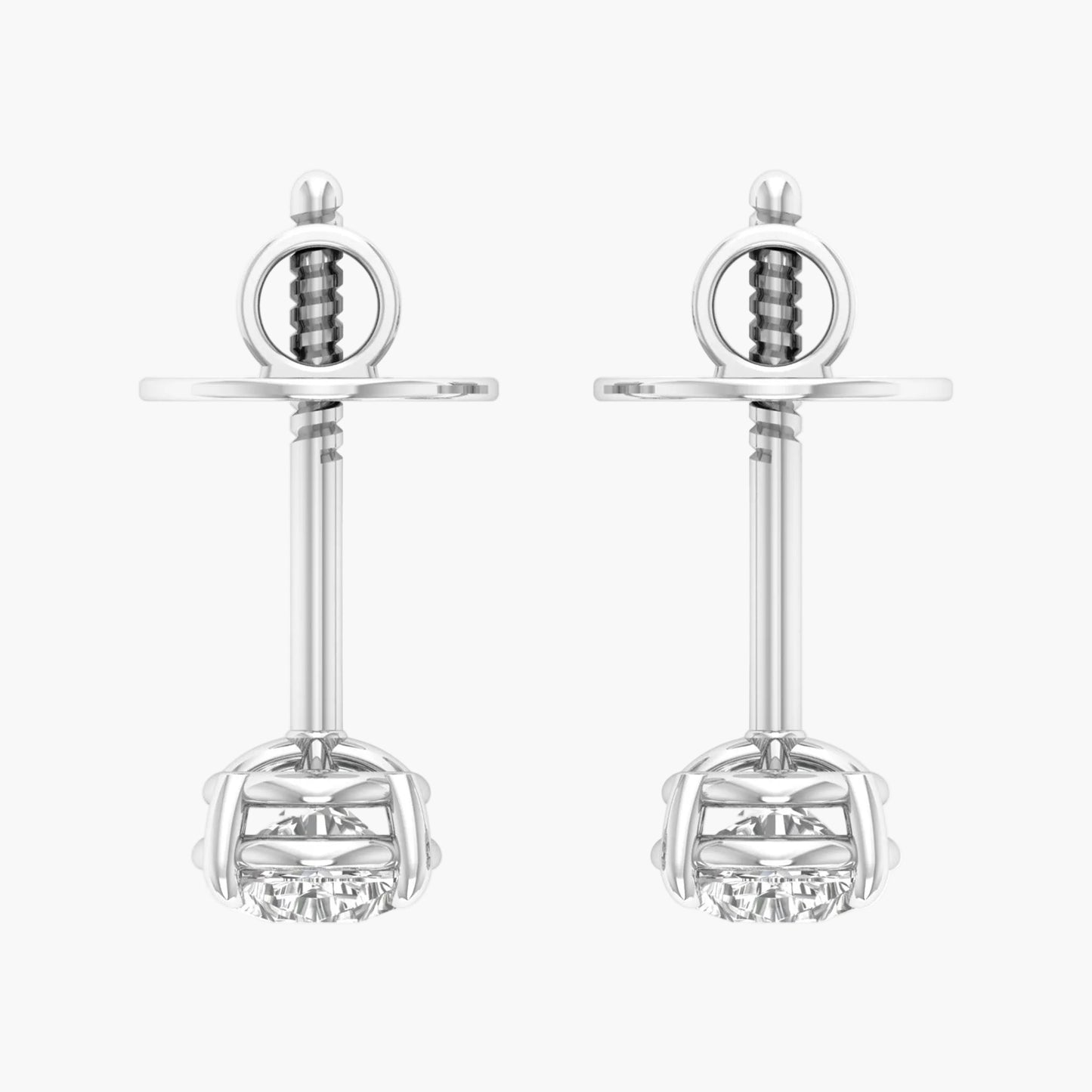 Pair of silver earrings with clear gemstones on a white background