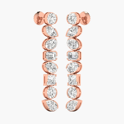 Rose gold earrings with clear gemstones on a white background