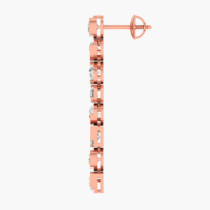 Rose gold earring with clear gemstones on a white background