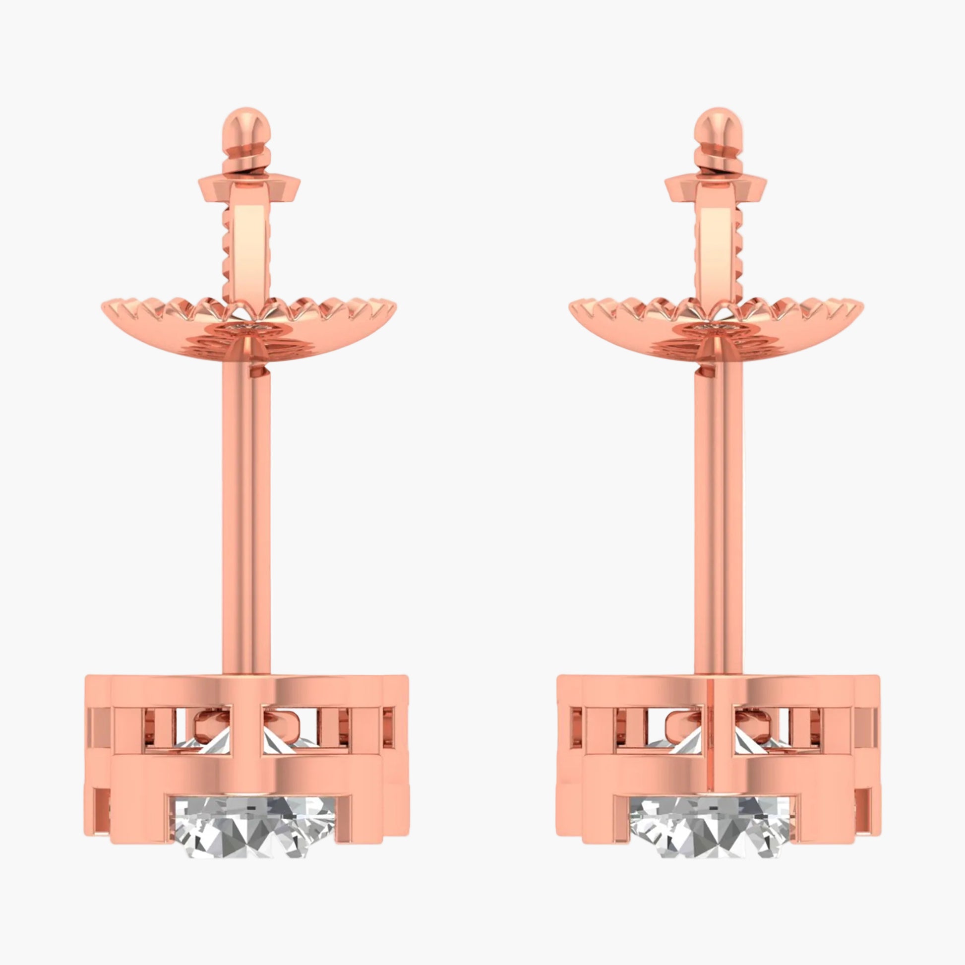 Rose gold earrings with clear gemstones on a white background