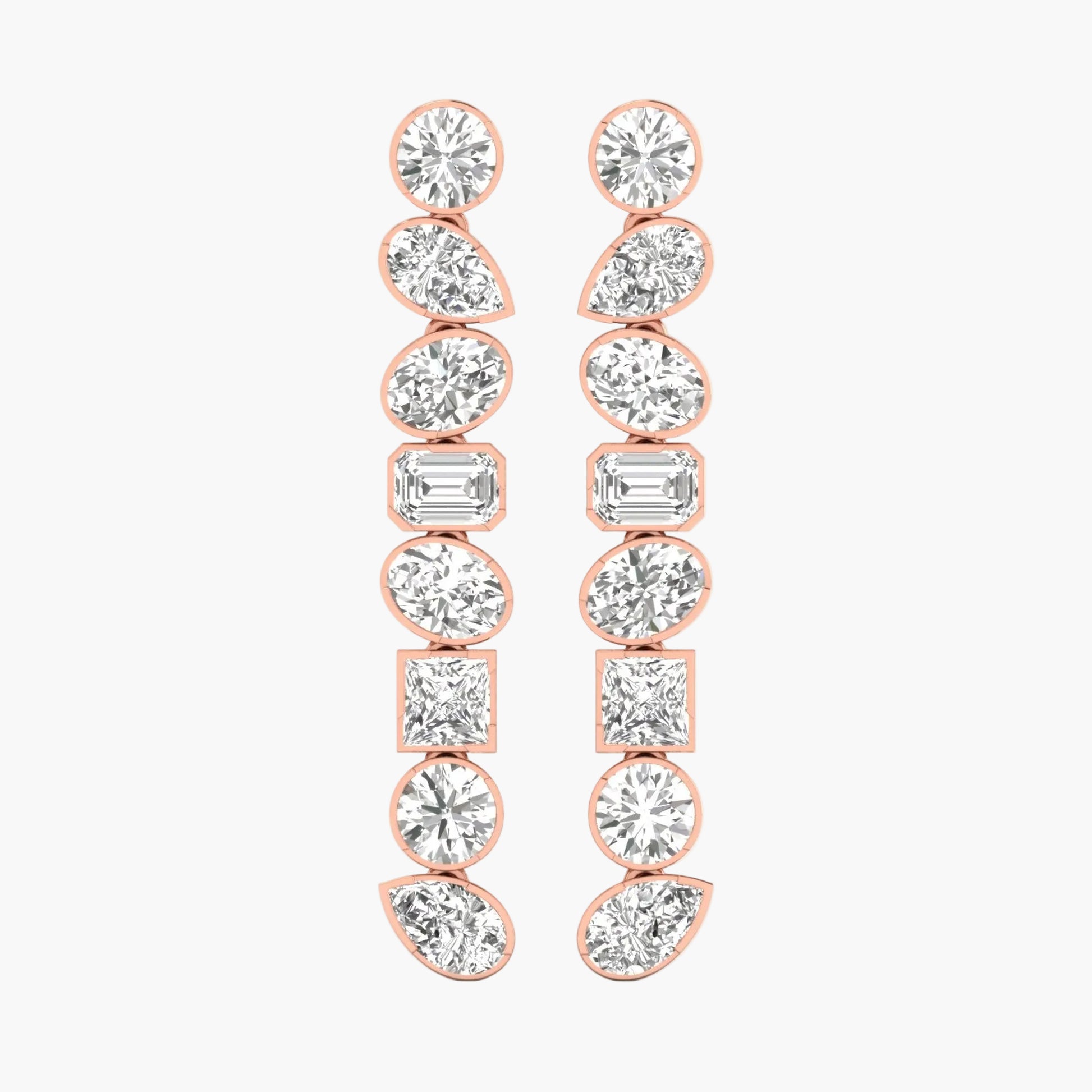 Rose gold earrings with clear gemstones on a white background