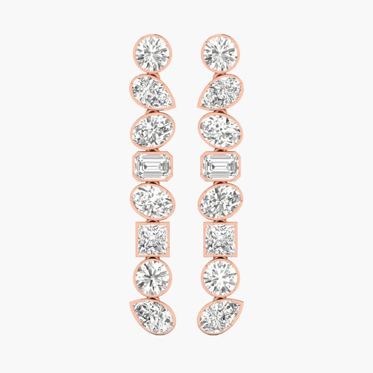Rose gold earrings with clear gemstones on a white background