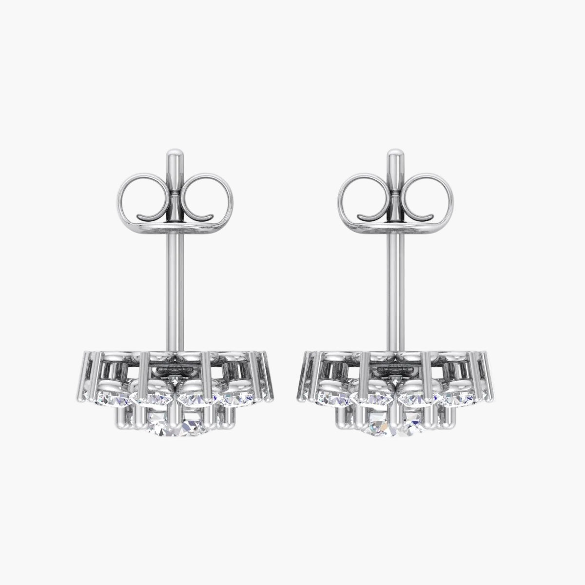 Pair of silver earrings with gemstones on a white background