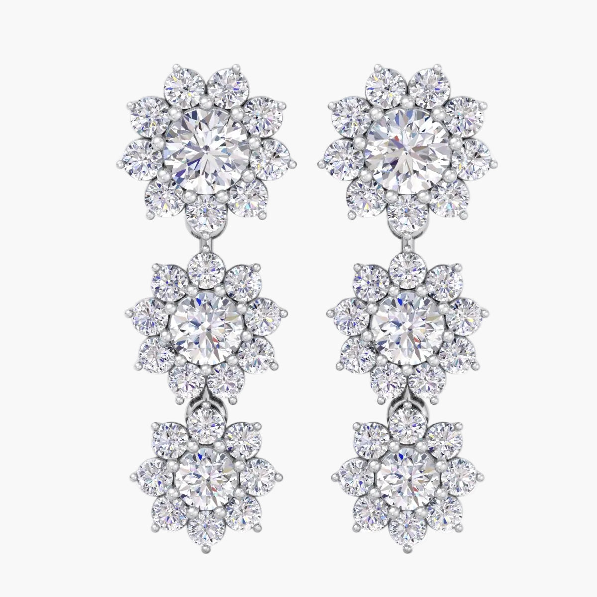 Pair of diamond earrings on a white background
