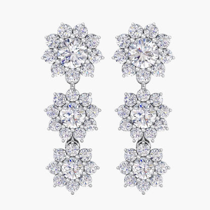 Pair of diamond earrings on a white background