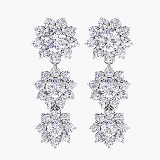 Pair of diamond earrings on a white background