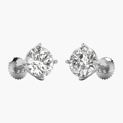 Pair of diamond stud earrings on a white background