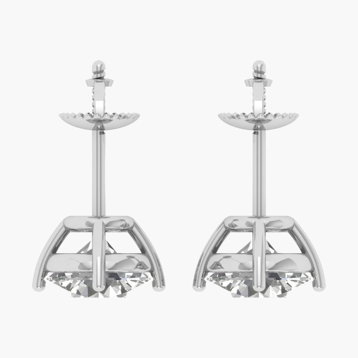 Pair of silver candle holders on a white background