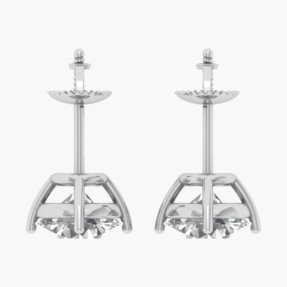 Pair of silver candle holders on a white background