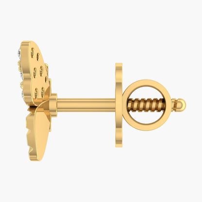 Gold earring on a white background