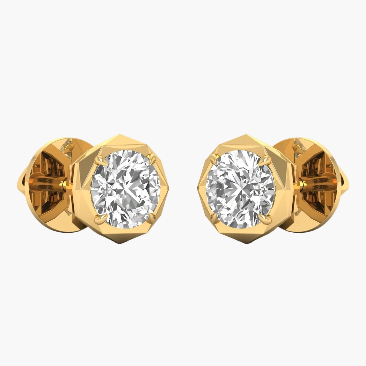 Gold earrings with clear gemstones on a white background