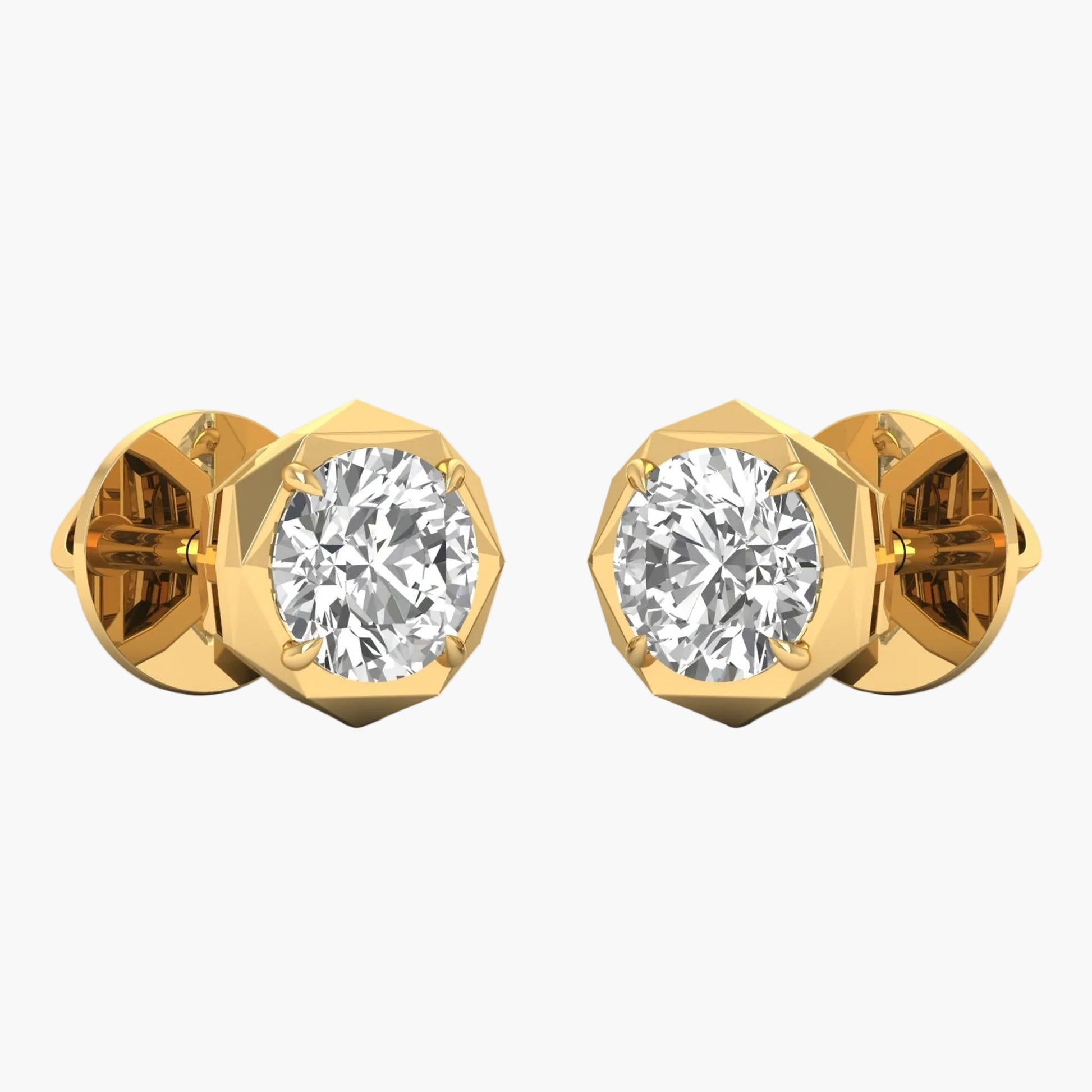 Gold earrings with clear gemstones on a white background
