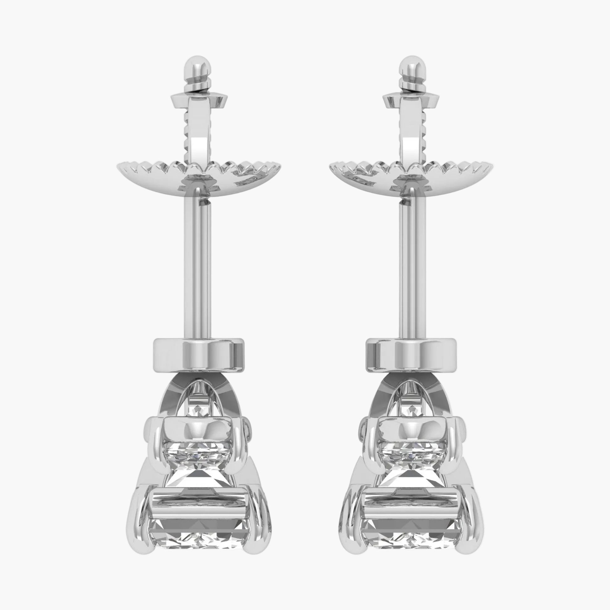 Pair of diamond earrings on a white background