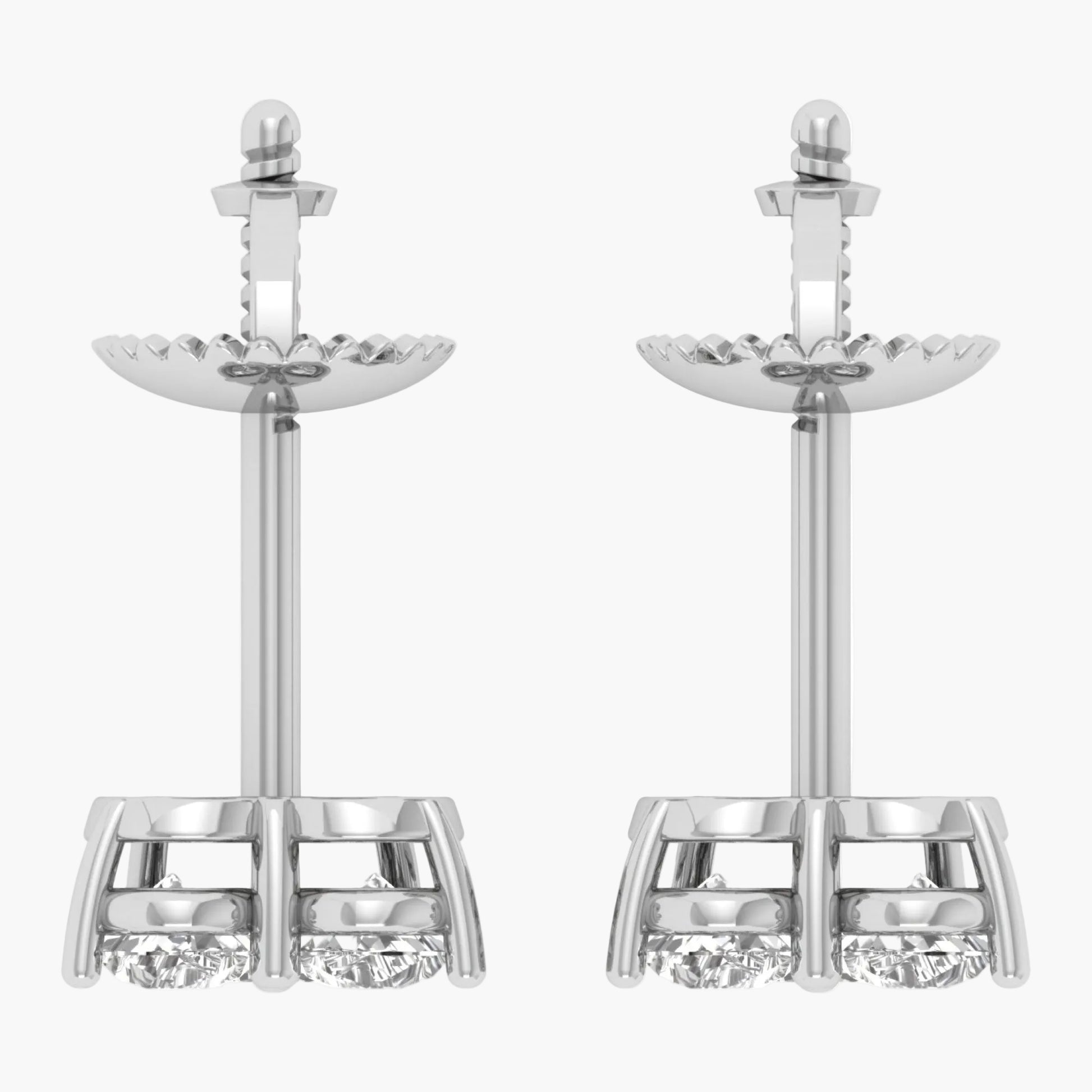 Pair of silver earrings with clear gemstones on a white background