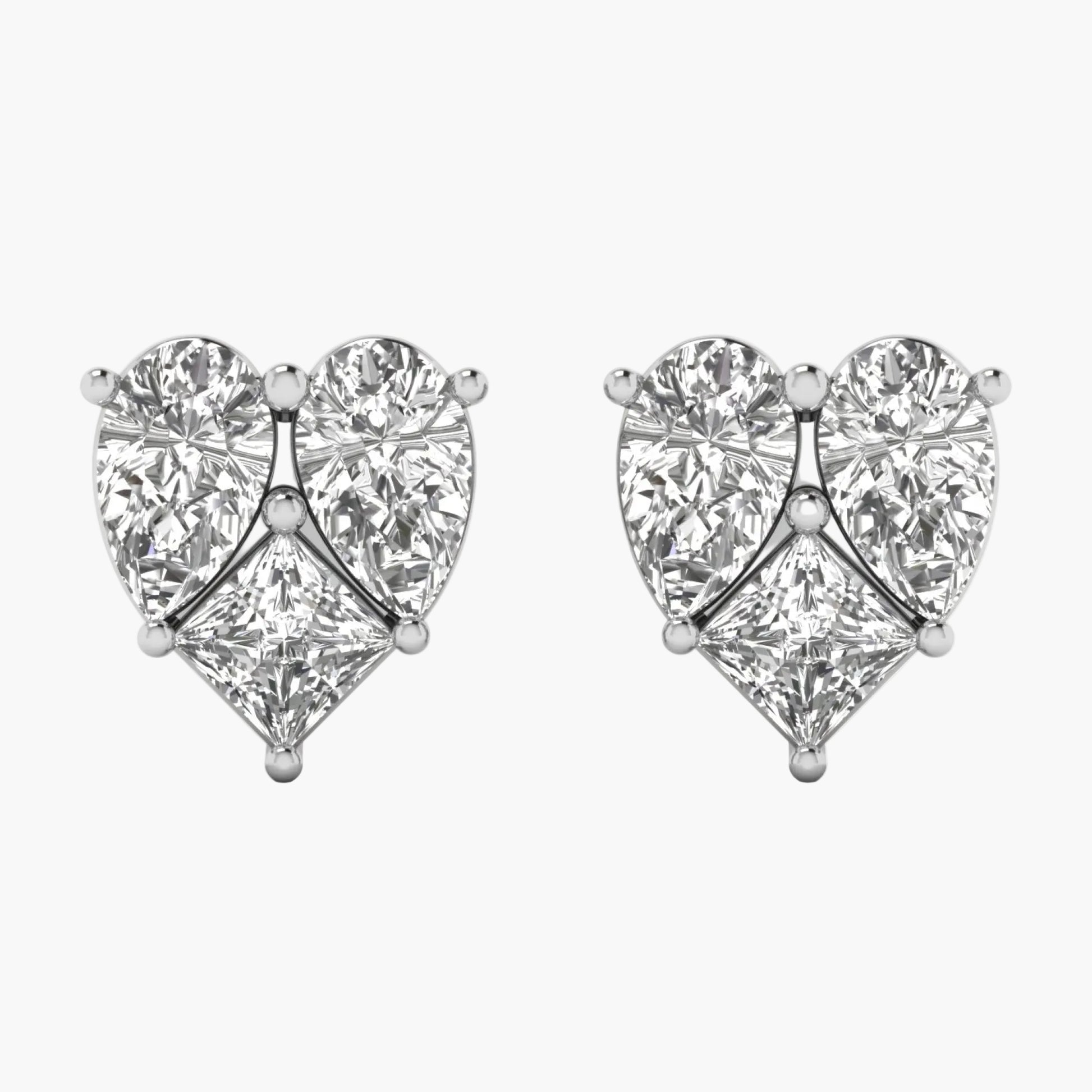 Heart-shaped diamond earrings on a white background