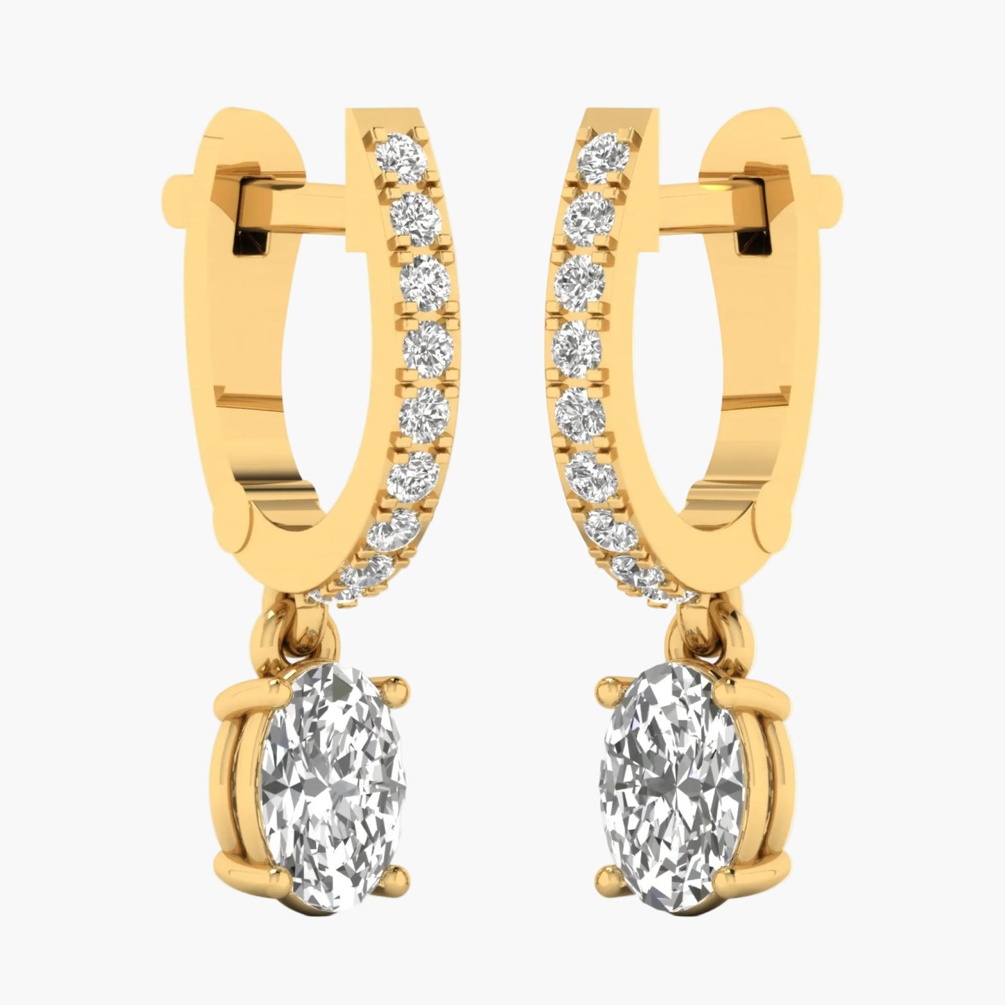 Gold hoop earrings with round gemstones on a white background