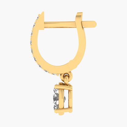 Gold hoop earring with a rectangular gemstone on a white background