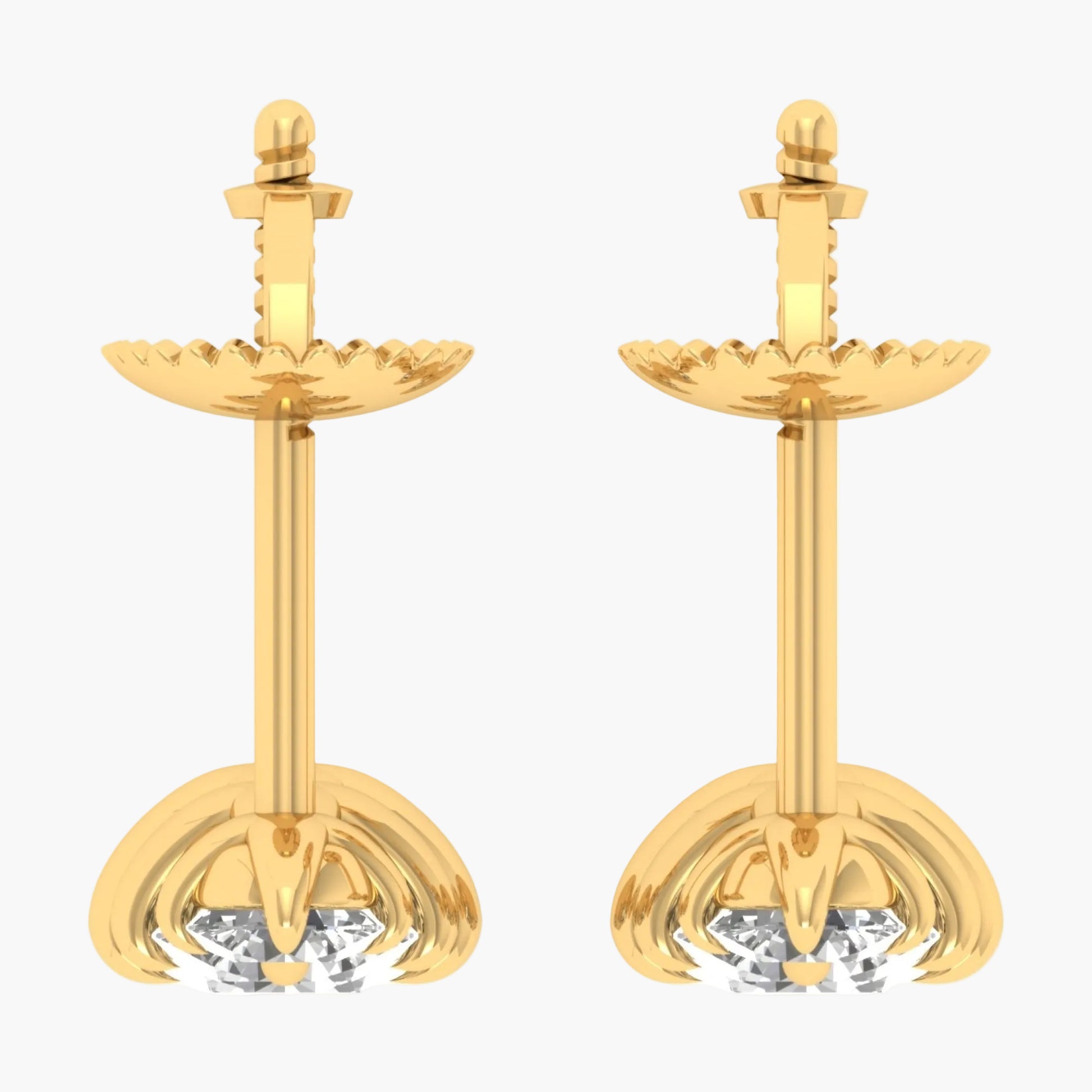 Pair of gold earrings with clear gemstones on a white background