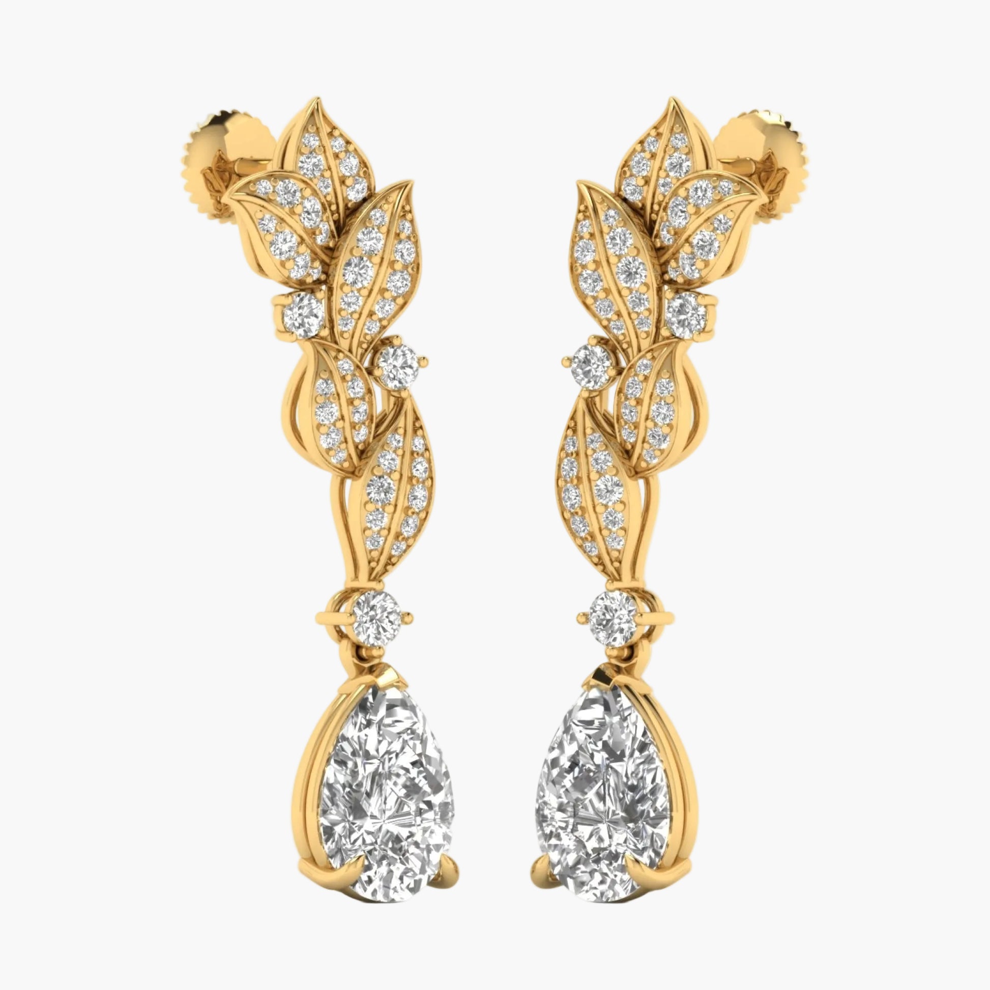 Gold earrings with leaf design and clear gemstones on a white background
