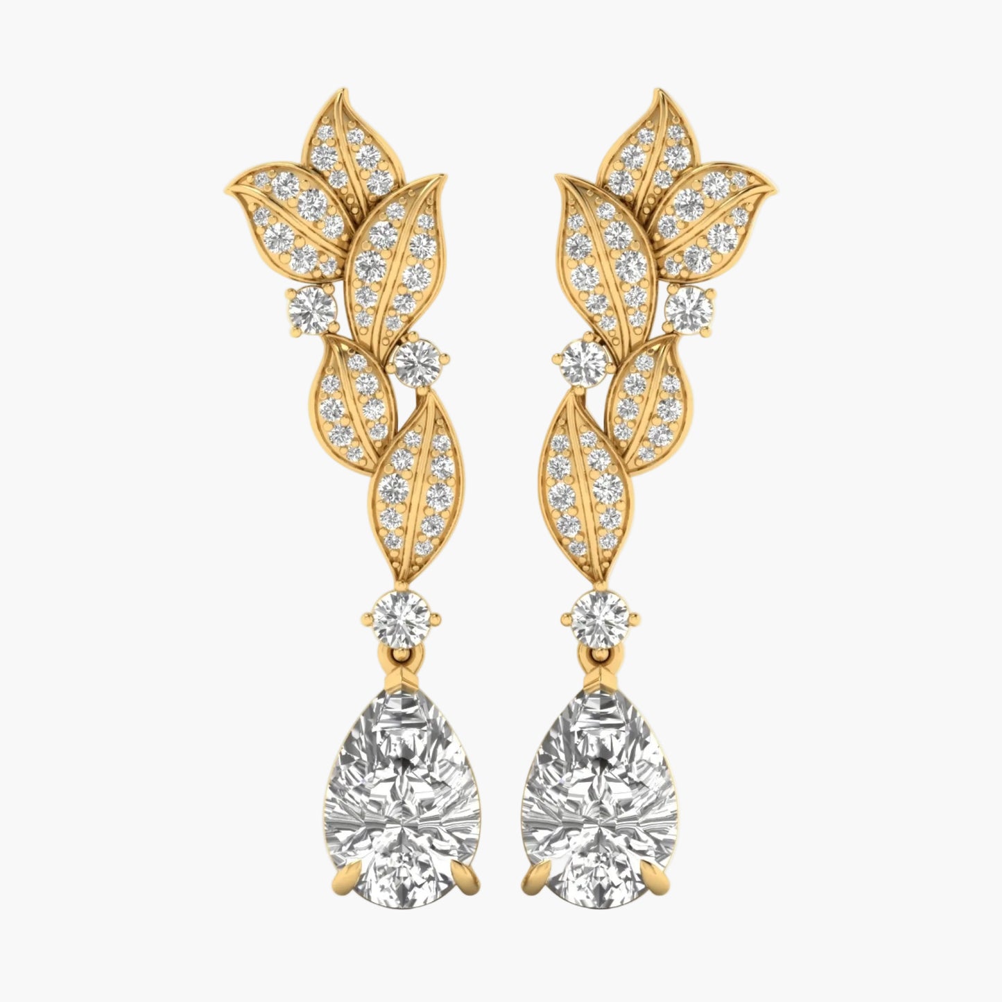 Gold leaf-shaped earrings with clear gemstones on a white background