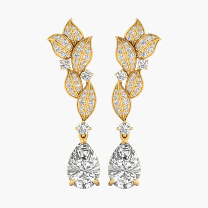 Gold leaf-shaped earrings with clear gemstones on a white background