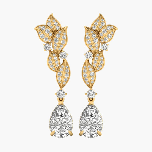 Gold leaf-shaped earrings with clear gemstones on a white background