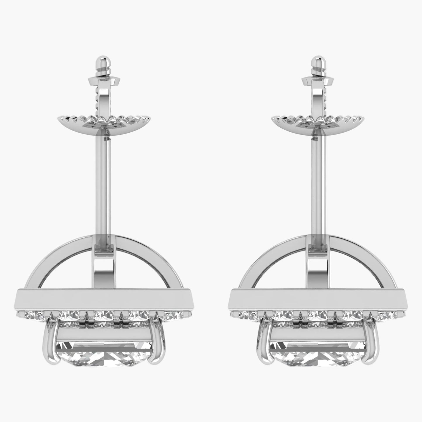 Pair of silver earrings with clear gemstones on a white background