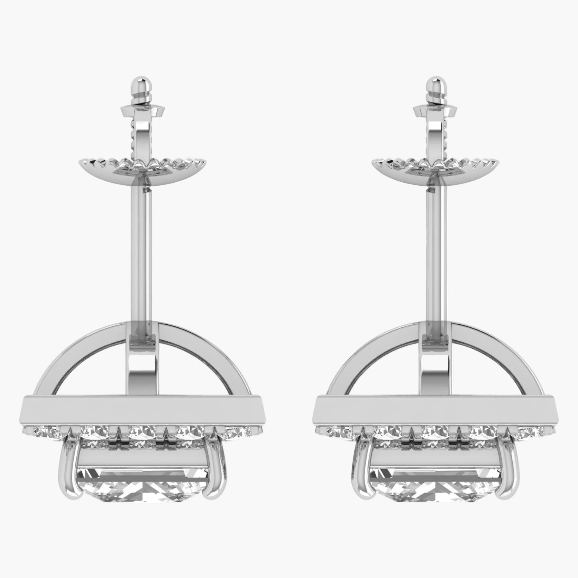 Pair of silver earrings with clear gemstones on a white background