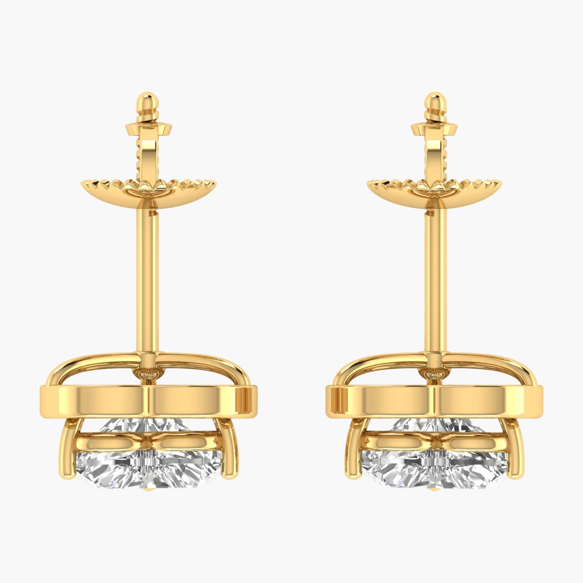 Gold earrings with clear gemstones on a white background