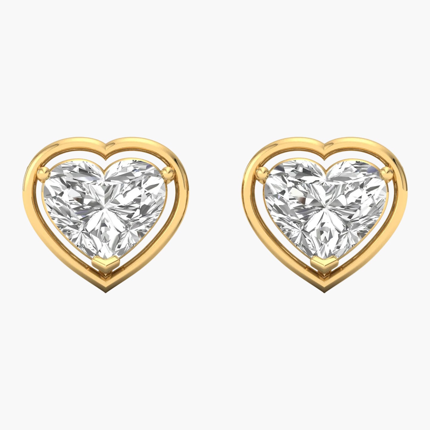 Heart-shaped diamond earrings with gold frames on a white background