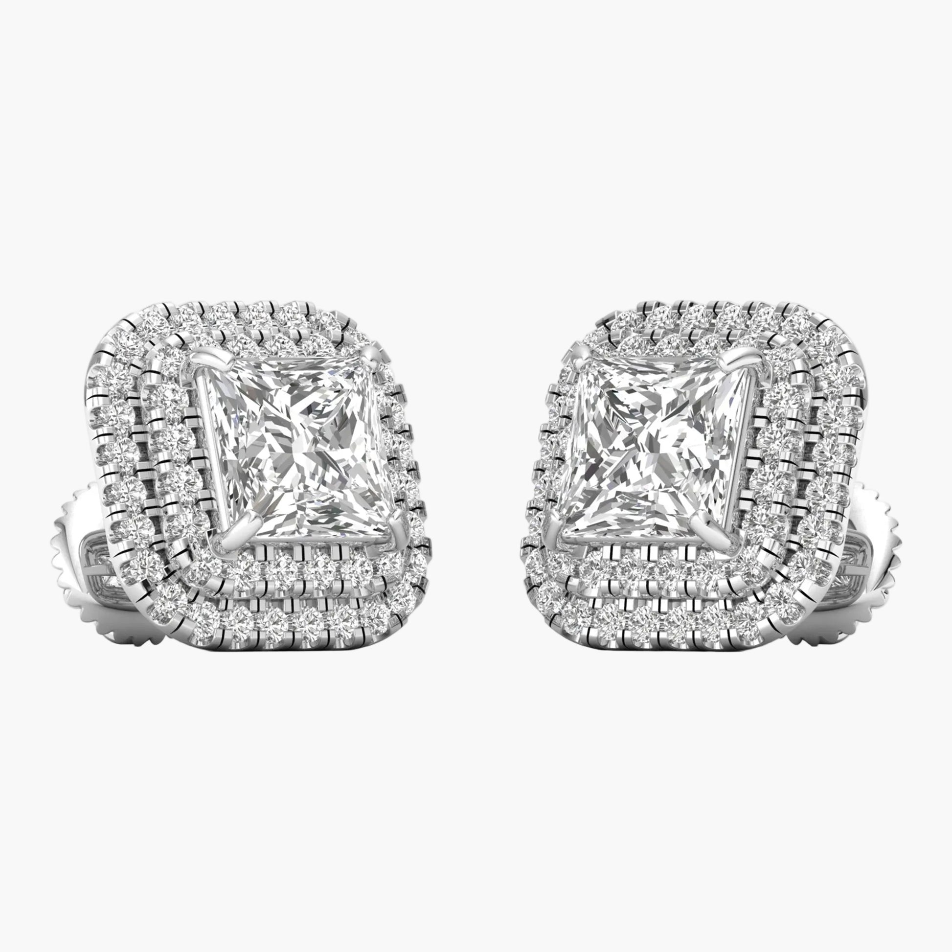 Pair of diamond earrings on a white background