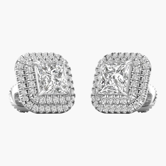 Pair of diamond earrings on a white background